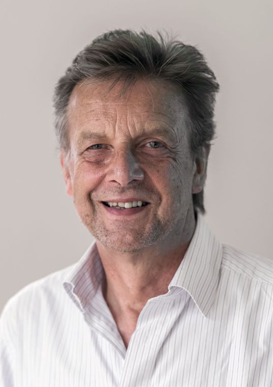 A  man smiling for the camera