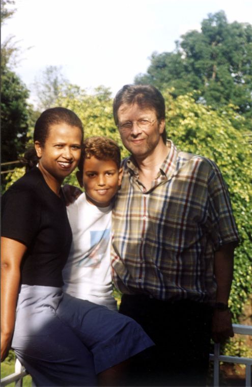 A man, woman and child.