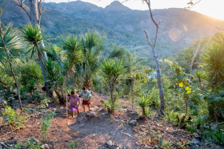 Maria Rosario and Eduarda Aldana Garcia (both are blind) walking up the way from their home to the street.