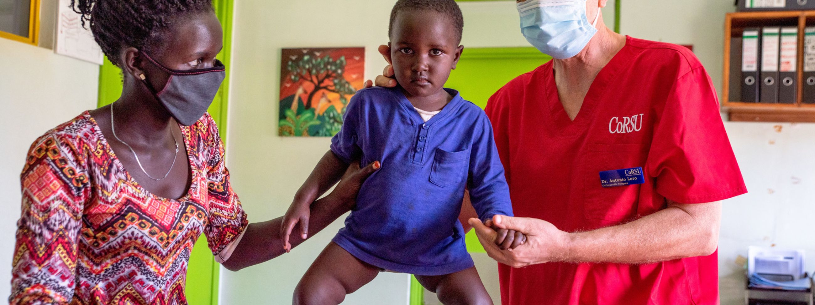 Eight-year-old Sherifa, who lives with cerebral palsy, with a friend on their way home from school in Lilongwe District, Malawi.
